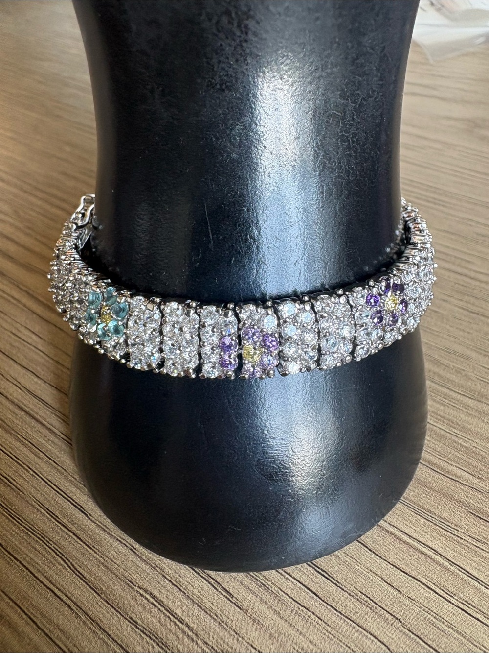 Silver-Tone Tennis Bracelet with Blue and Purple Flower Accents